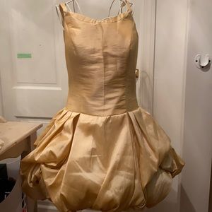 Polyester. New. Never worn.